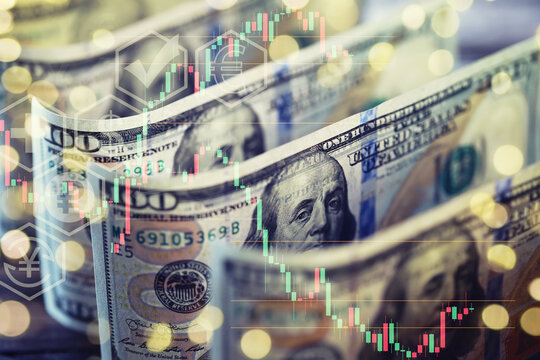 United States dollars. Pile of hundred USD banknotes. Green toned photo with selective focus