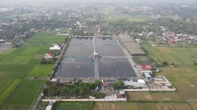 Aerial footage of the Wastewater Treatment Plant in Bantul, Yogyakarta. Its purpose is to prevent water and soil pollution, protect human health, and preserve aquatic ecosystems, allowing for reproces