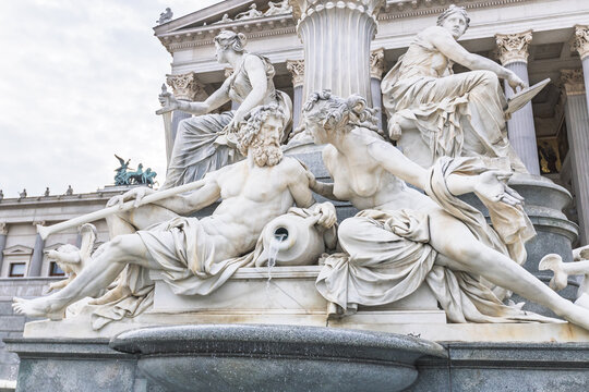 Detail of allegorical marble sculptures at the Pallas Athene fountain in front of Austrian Parliament, Vienna