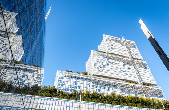 Paris, France - April 7, 2026: Low angle view of the "Tribunal de Paris" (Courthouse of Paris), a 38 storeys, 160 metres high building by architect Renzo Piano, seen from the Parvis Robert Badinter.