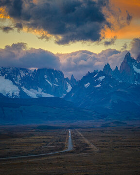 Straight road leading to Fitz Roy mountains, Patagonia Argentina