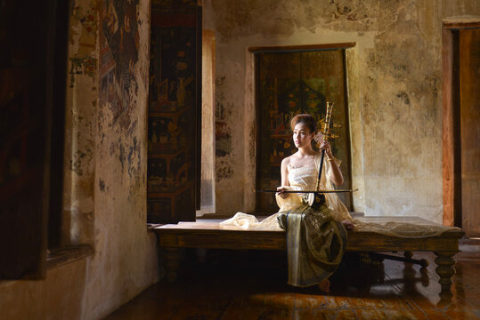Beautiful Thai woman portrait dress up in traditional thai costu