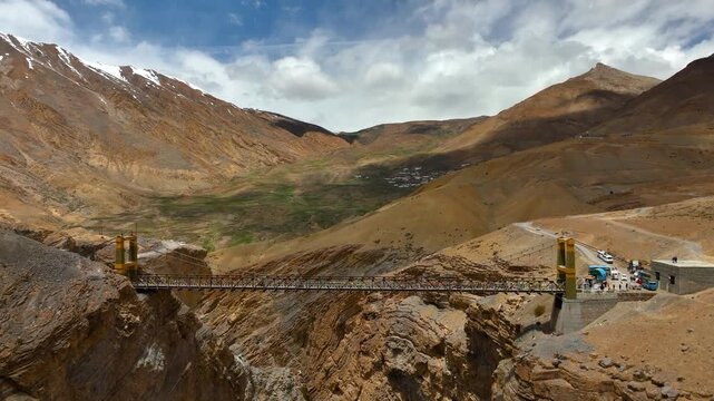 Chicham Bridge drone view, Spiti Valley suspension bridge aerial landscape
Aerial view of Chicham Bridge in Spiti Valley Himachal Pradesh India
Drone shot of Chicham Bridge over deep Himalayan canyon 
