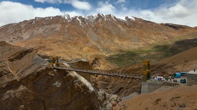 Chicham Bridge drone view, Spiti Valley suspension bridge aerial landscape
Aerial view of Chicham Bridge in Spiti Valley Himachal Pradesh India
Drone shot of Chicham Bridge over deep Himalayan canyon 