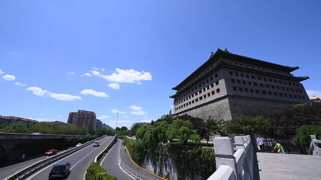 Ancient Chinese Gate Tower Beside Urban Road in Xi'an