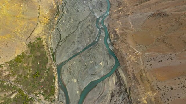 spiti river aerial view, dramatic canyon landscape, himalayas himachal pradesh india
spiti valley river drone shot, rugged mountain canyon, cold desert india
winding spiti river aerial, dramatic sky h