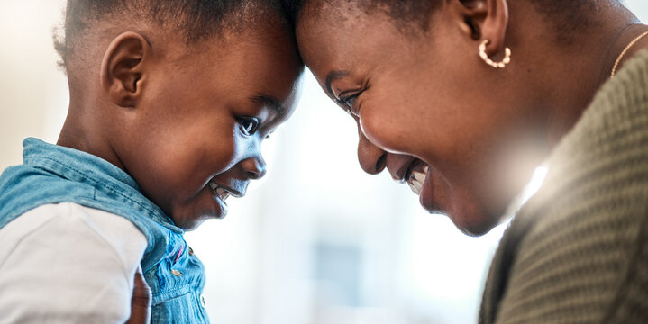 Happy, mom and bonding with child, home and black woman with affection for daughter and love. Toddler, growth and person with forehead touch for development, childcare and mother with girl in house