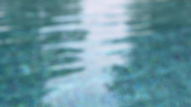 Abstract blur outdoor swimming pool in tropical resort hotel summer background