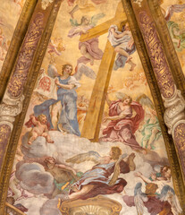 Obraz premium CREMA, ITALY - MARCH 20, 2026: The fresco of angels with the Crucifixion instruments (cross) in cupola of the church Santuario di Santa Maria della Croce by Giacomo Parravicino (1702). 