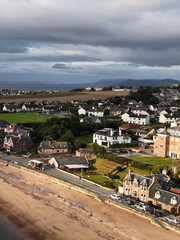 Fototapeta premium Aerial View of Rosemarkie Coastal Village and Beachfront Houses in Scotland