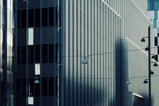 Abstract view of urban modern facade as corporate lines and windows create pattern across the building architecture for design backgrounds