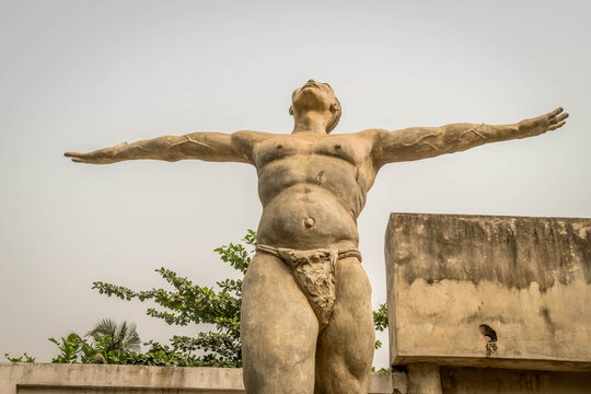 African slaves memorial in Benin town of Ouidah, reminding about tragic history of slave trade and Black history tragedy in West Africa.
