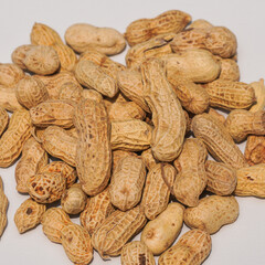 Fototapeta premium Pile of Raw Peanuts Isolated.
