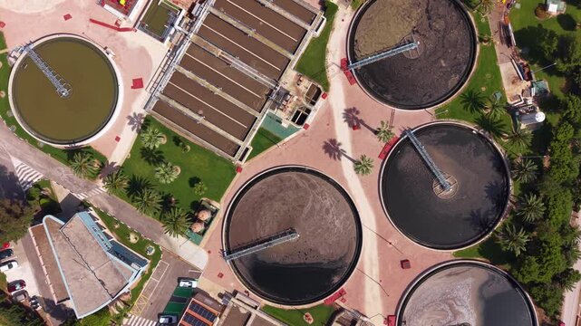 Modern wastewater treatment plant with circular clarifiers, aeration basins and biological treatment for nitrogen and phosphorus removal using activated sludge process