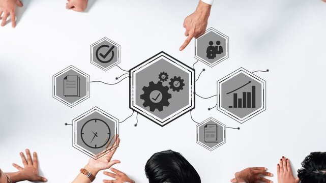 Business teamwork concept showing collaboration through icons and symbols representing strategy, efficiency, planning, and operation management on a workspace Gluon.