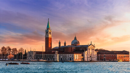 beautiful view at Abbey of San Giorgio Maggiore from San Marco square in Venice, Italy. Venetian sunset landscape of antique architecture. © Yaroslav