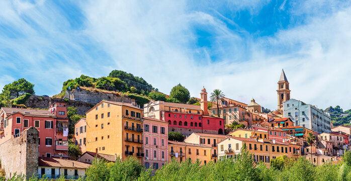beautiful panoramic landscape of european colorful town in old vintage style with beautiful towers and facades in touristic summer season. Urban view of italian city during summer day on evening.
