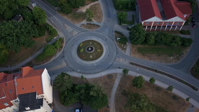 Aerial Top view of vehicles at roundabout street Time lapse Hyperlapse Smooth Town 4K