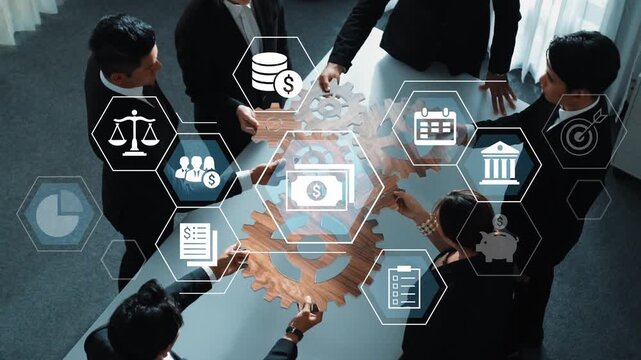 Diverse Business Team Collaborating on Financial Strategies with Icons Representing Law, Economics, Planning, and Success in a Modern Office Environment Gluon.