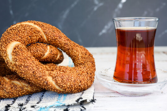 simit &ccedil;ay bagel bread with sesame seeds and tea
