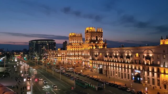 Illuminated Minsk City Gate Buildings and Traffic at Dusk