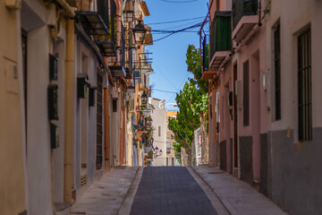 Obraz premium Authentic Mediterranean narrow street in the small coastal town in Spain