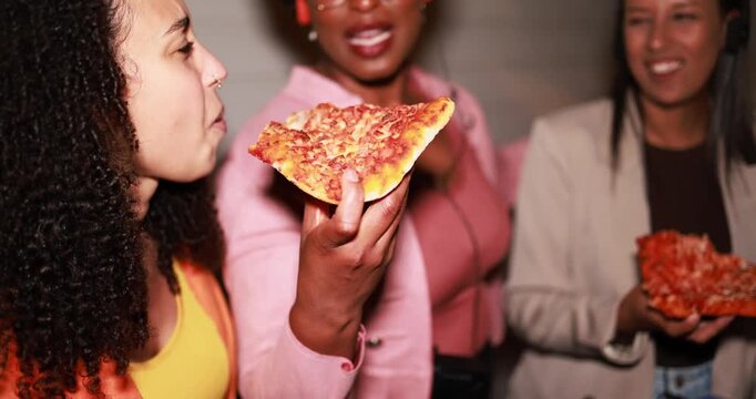 Multiracial girls having fun eating pizza together while listening music with vintage retro devices outdoor - Party, nightlife and people lifestyle concept 