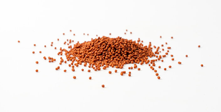 Aquarium Fish Food, Pressed Brown Granules Isolated, Nutrition Supplements, Pills, Tablets