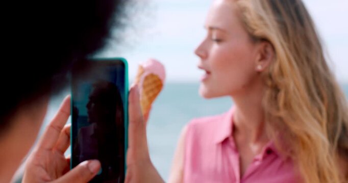 Influencer, phone screen and friends at beach with ice cream, happy or digital memory on summer vacation. Smile, post or people with cone, social media update or content creation on seaside trip.