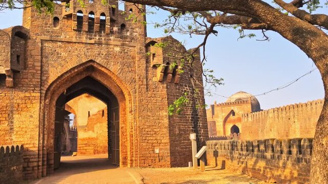 Sherja Darwaza Gate entrance with Gumbad Darwaza and fort side wall at bidar, karnataka, india. day time, push in shot, hand held shot, 4k.