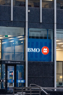 MONTREAL, CANADA, 23 December 2025 : Bank of Montreal building entrance snow urban architecture