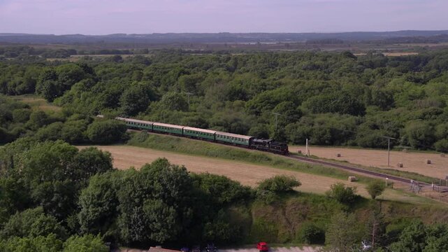Vintage Heritage Train Passing Through Countryside Near Corfe Castle