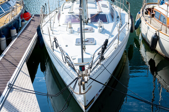 Boats and yachts moored in city harbor. Sea port in Ostend, Belgien.