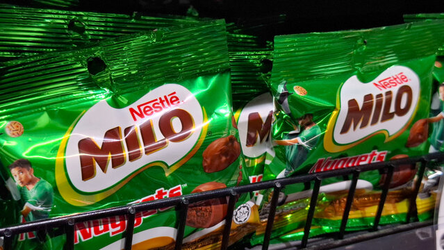 Nestle Milo Nuggets chocolate malt snacks in green foil packaging displayed on a supermarket retail shelf on May 2, 2026 in Bangkok, Thailand 