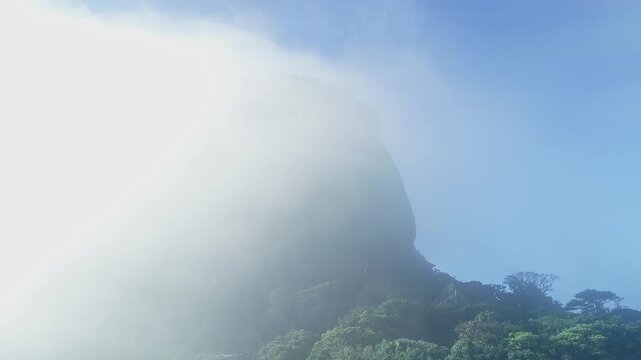 Drone view of Kotebetta cliffs in Western Ghats covered in mist and scenic natural beauty
