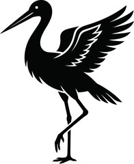 Obraz premium Black silhouette of a bird standing on one leg with wings spread