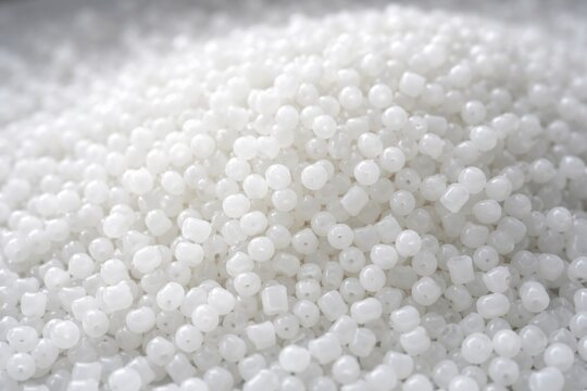 Raw white plastic pellets of polyethylene for molding processes