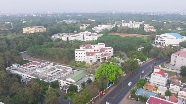 Karnataka State Open University with Vijnana Bhavan, M Tech Material Science and KSOU Convocation Hall at Mysuru, karnataka, india. day time, semi orbit shot, drone shot, 4k.