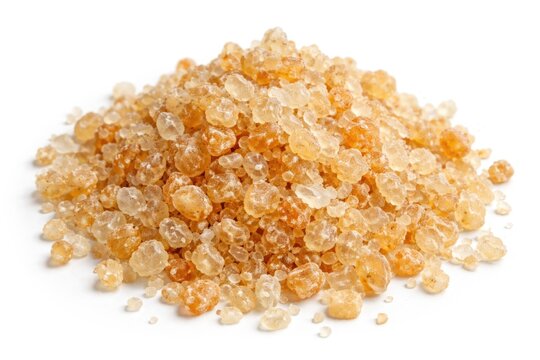 High resolution image of tragacanth gum granules with varied texture on plain white background