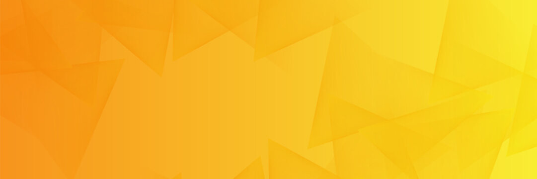 Abstract yellow and orange geometric banner background with dynamic overlapping triangles and vibrant gradient