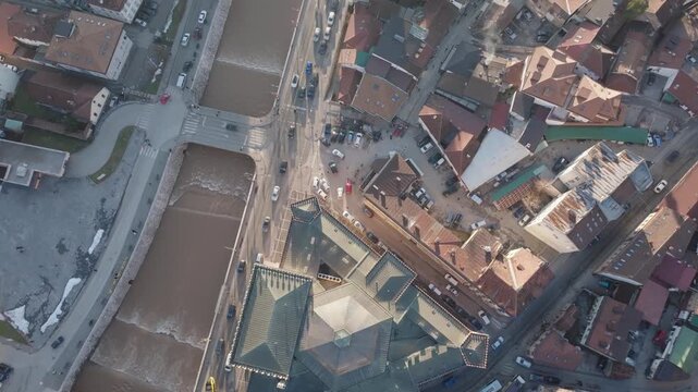 Sarajevo city panorama from Vijecnica aerial drone morning haze backlight