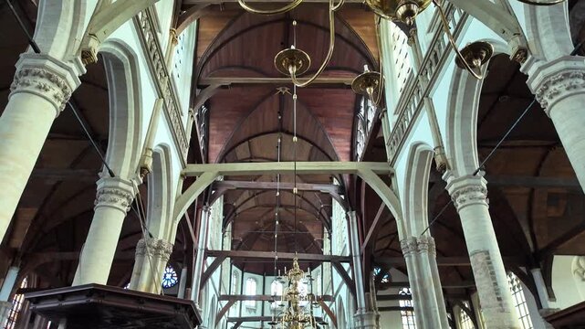 looking up ate ceiling of Oude Kerk in Amsterdam