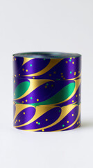 Obraz premium Three Rolls of Purple, Green, and Gold Patterned Ribbon Stacked on a White Background. High Resolution Photography