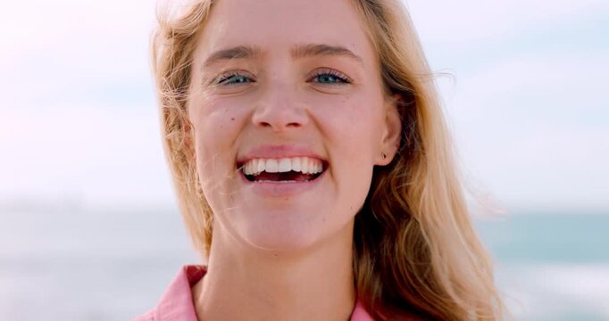 Travel, face or woman at beach with laugh, ocean trip and fresh air on summer break. Windy, happiness or female person at seaside with portrait, tourist vacation or outdoor getaway in Australia.