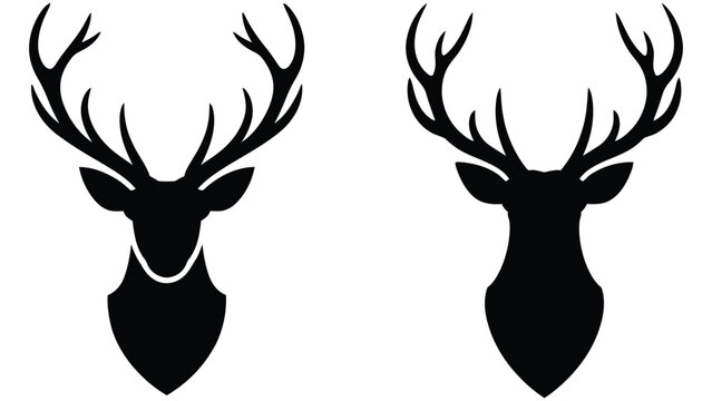set of two silhouettes of deer heads with antlers