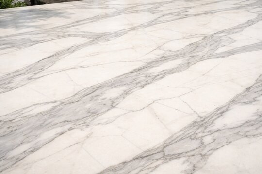White marble granite surface with smooth gray abstract design suitable for exterior spaces