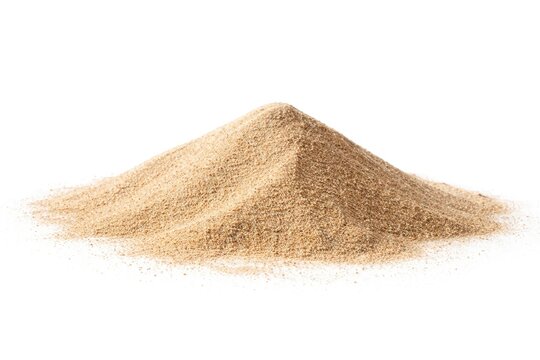 Sandy mound of dry beach sand on plain white backdrop with copy space