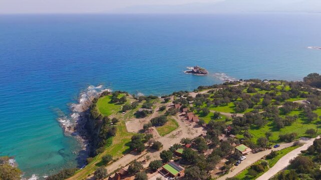 Aerial Drone View of Coastal Campsite and Volcanic Rock Formations in Akamas Cyprus