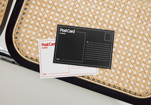 Mockup Of Two Customizable Post Cards On Chair