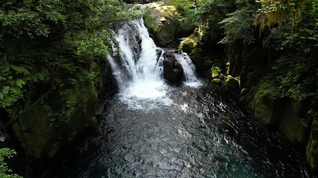 Tengu Waterfall, Kikuchi Gorge Japan | Fresh Green Forest, Clear Waterfall and Gorge Landscape Aerial Drone Background